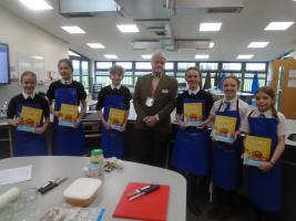 Competition finalists with judge